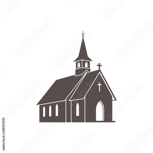 Traditional church building with steeple and cross on a grassy hill