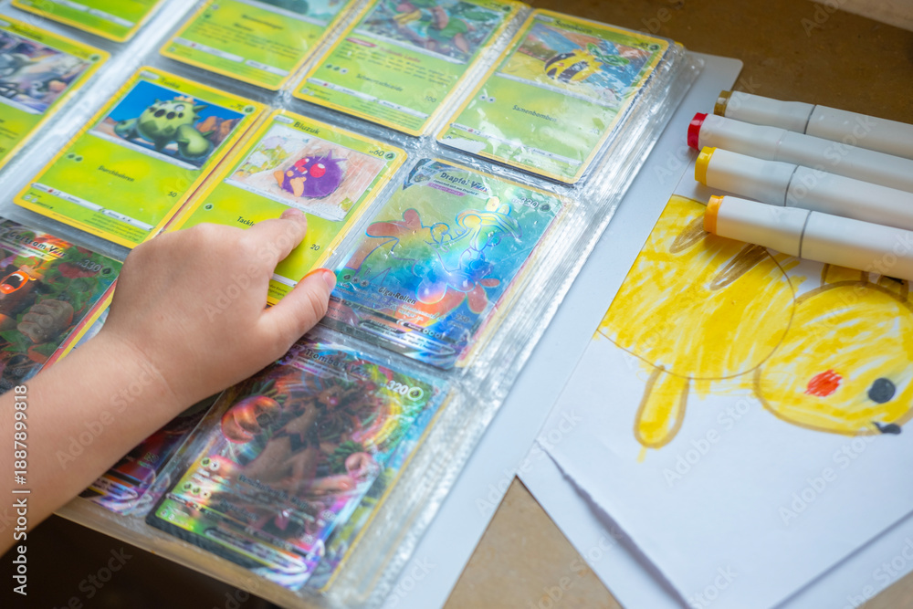 Fototapeta premium draw yellow Pikachu, artistic expression development, playfulness imagination, Educational Games, Pokemon Fan Culture, Frankfurt - 27 May, 2024