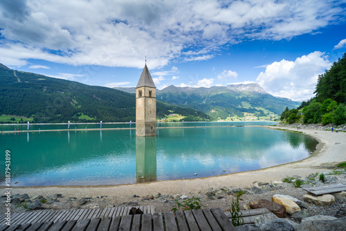 Submerged church tower of Alt Graun in Lake Reschen in South Tyrol, Italy