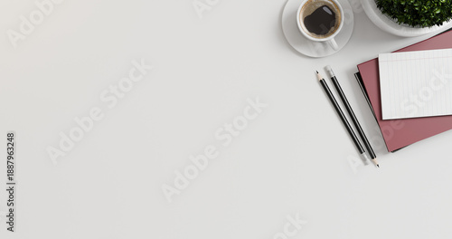 Top view office table desk with laptop, coffee, pencil, leaves with 3D rendering