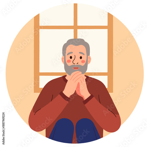 Elderly man sitting by the window looking thoughtful and pensive  