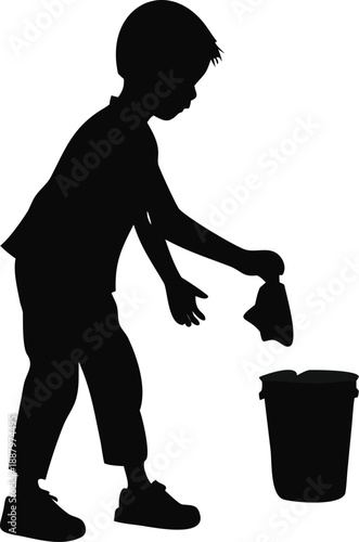 Silhouette Of A Boy Picking Up Trash