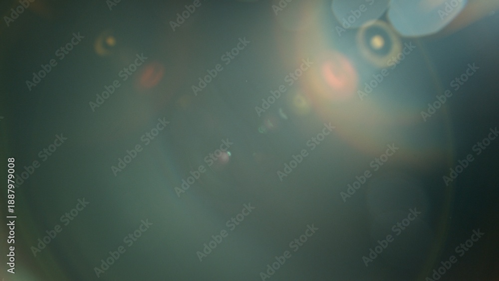 Fototapeta premium Real Lens Flare Reflections for Overlay or Transition Isolated on Black Background
