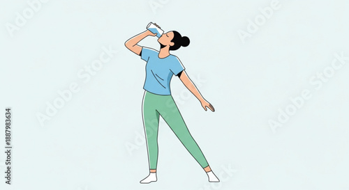 Woman drinking water from a bottle while exercising outdoors actively