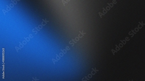 Fotografía Deep blue light beam on dark grainy background with subtle grey tones for minima