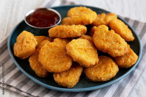 Chicken Nuggets with Sweet Chili Sauce on a Plate, side view.