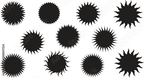 Collection of black spiky oval shapes on white background