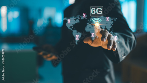 Photos Businessman interacting with virtual world map and 6G wireless network interface, representing future global communication, ultra fast connectivity, and next generation digital technology