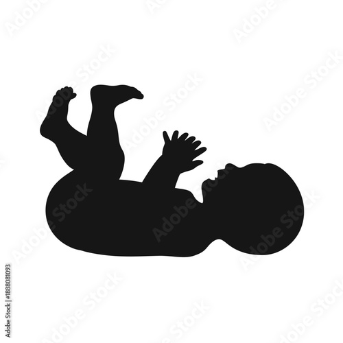 Black silhouette of a baby lying on their back and reaching upwards