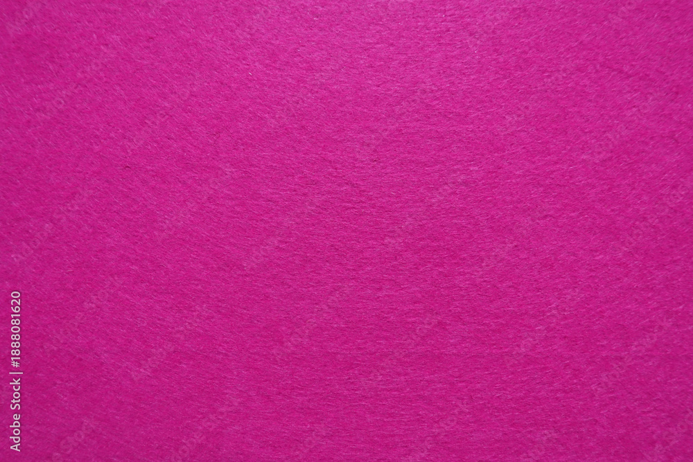 Fototapeta premium Solid pink felt fabric texture background