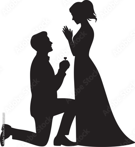 Silhouette of man proposing with ring to woman in long dress
