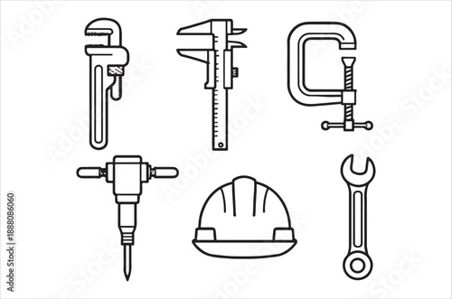 A collection of hand tools including a wrench calipers and a construction helmet