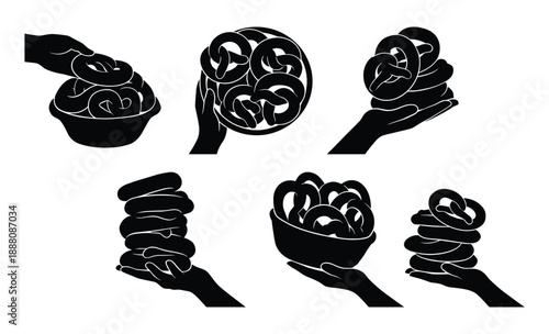 Set of black silhouettes of hands with pretzels isolated on a transparent background