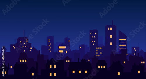 A vibrant cityscape at night, with illuminated buildings and a deep blue sky, showcasing the hustle and bustle of urban life