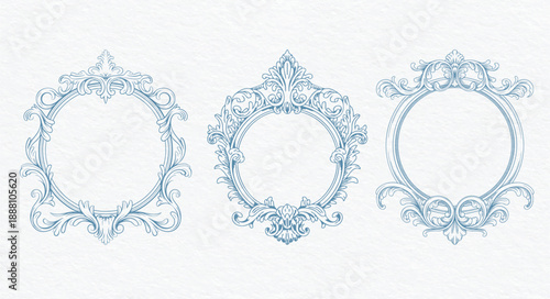 Set of vintage baroque monogram frames with ornate scrollwork.
