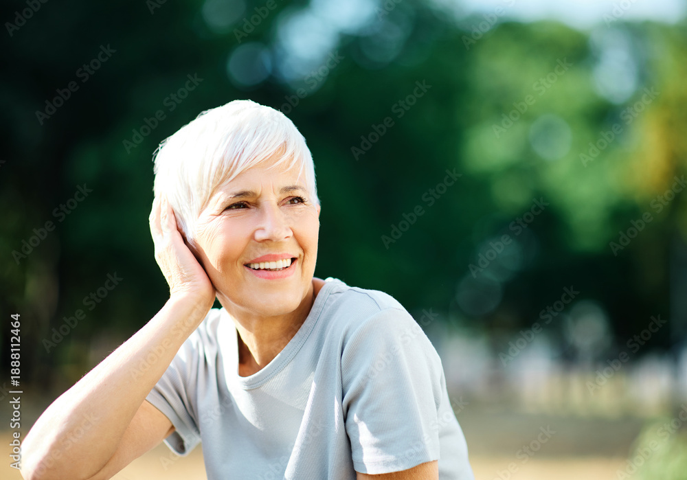 Fototapeta premium Beauty portrait of a sensual senior elderly woman, skin care and fashion concept. Aesthetic cosmetology and dermatology, face care and facial treatment, vitality, active healthy senior fitness sport c
