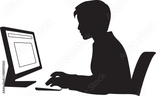 Silhouette of person using computer at desk monitor