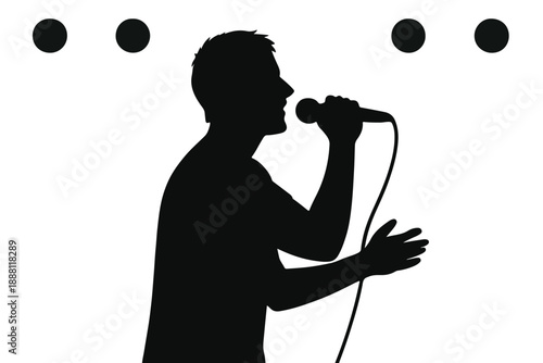 Singer silhouette holding microphone on stage,