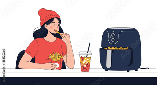 Young woman wearing a red beanie enjoying french fries next to a modern air fryer on a kitchen counter for healthy cooking.