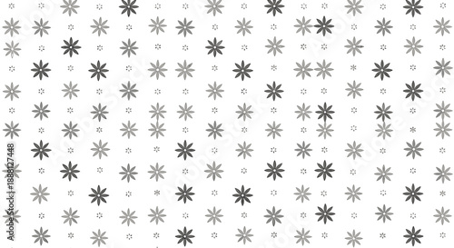 Monochrome pattern featuring various styles of snowflake-like stars and floral elements arranged in a seamless repeating design.