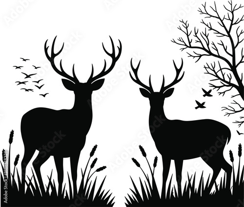 A pair of noble deer silhouettes in a grassy field with a flock of birds in the sky and a bare tree