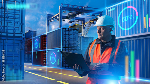 Container terminal logistics, cargo monitoring and smart port operations as a logistics manager analyzes shipment data on a laptop among shipping containers.