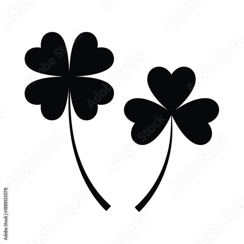 Black silhouette illustration of a four leaf clover and a three leaf clover