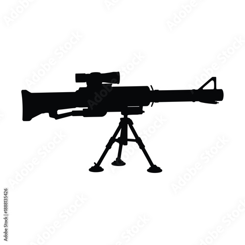 Silhouetted assault rifle with bipod and scope resting on a tripod