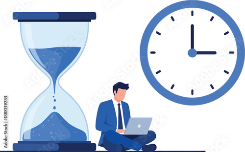 Businessman working under time pressure with laptop beside hourglass and clock