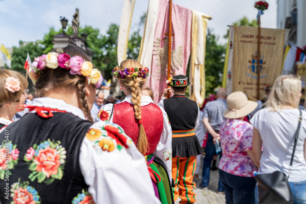 Fototapeta premium People in traditional Polish folk costumes at Łowicz Corpus Christi procession 