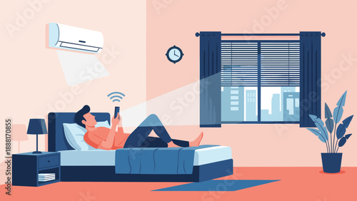 Young man lying comfortably in bed while using a smartphone app to control the air conditioning unit in his modern smart bedroom.