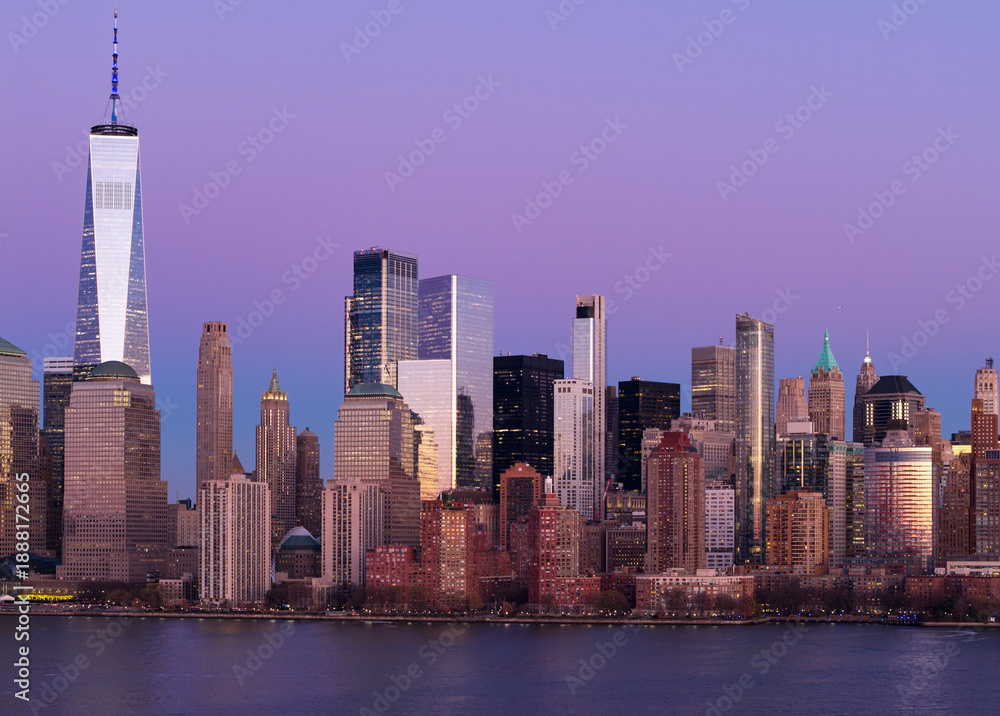 Obraz premium New York City Hudson River skyline. New York night metropolis skyline. NYC panoramic view of the Lower Manhattan skyline. New York City aerial skyline panorama. New York urban landscape.