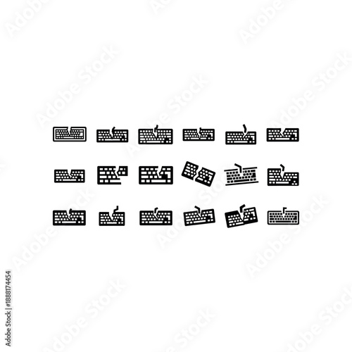 Various computer keyboards are scattered on a plain surface in disarray.