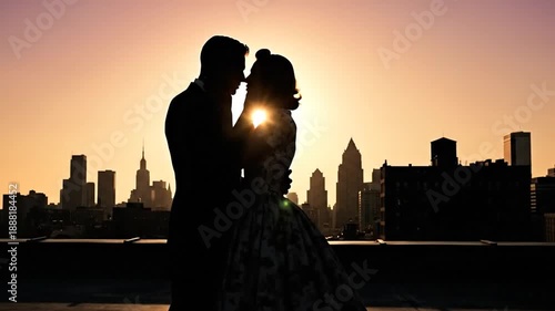 Silhouette of Glamorous 1950s Couple on City Rooftop at Sunset