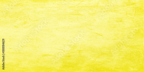 A vintage antique parchment backdrop features a stained brown grunge paper texture with an aged yellow pattern on a blank worn canvas for a retro design