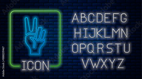 Glowing neon Hand showing two finger icon isolated on brick wall background. Hand gesture V sign for victory or peace. Neon light alphabet. Vector