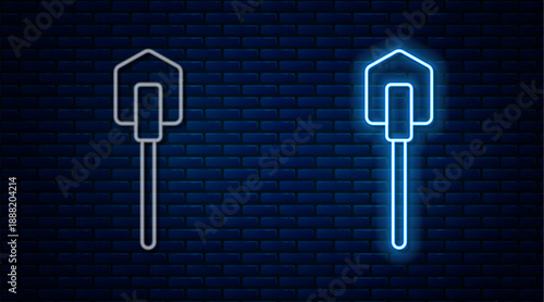 Glowing neon line Shovel icon isolated on brick wall background. Gardening tool. Tool for horticulture, agriculture, farming. Vector