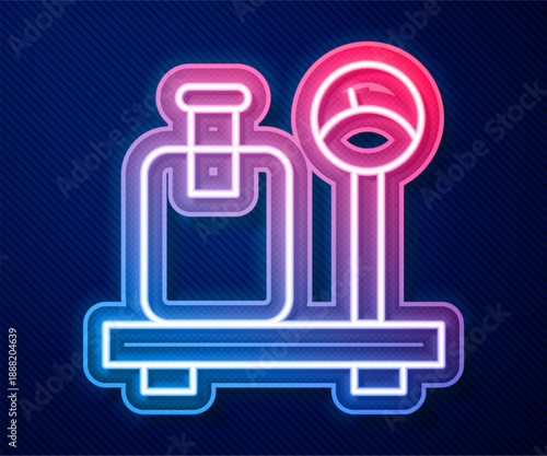 Glowing neon line Scale with suitcase icon isolated on blue background. Logistic and delivery. Weight of delivery package on a scale. Vector