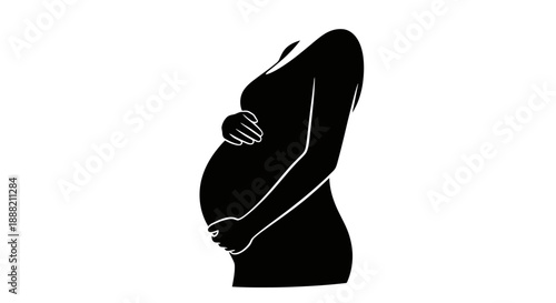 Silhouette of a Pregnant Woman Touching Her Belly.