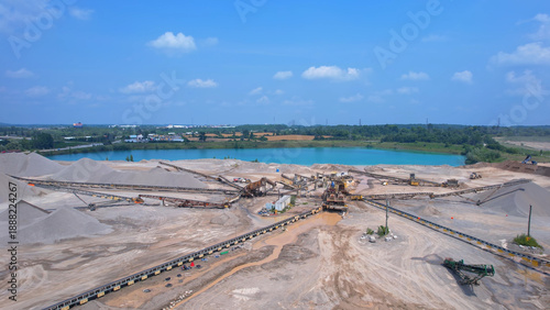 Canadian landscape of rare earth mining site. Critical rare earth minerals used for technology, weapon and electric vehicles. Concept of industry, nature, and environmental impact.