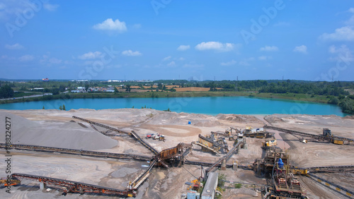 Canadian landscape of rare earth mining site. Critical rare earth minerals used for technology, weapon and electric vehicles. Concept of industry, nature, and environmental impact.