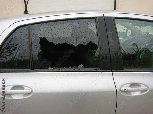 Wallpaper Mural Car break in with shattered smashed side window. Economic downturn fuels street criminality, shattered vehicle glass signaling hardship and criminality rise. Torontodigital.ca