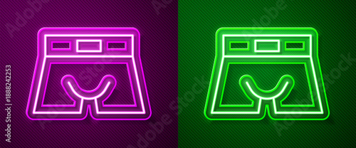 Glowing neon line Men underpants icon isolated on purple and green background. Man underwear. Vector