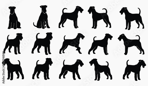 A collection of silhouetted airdale terrier dogs in various poses and arrangements