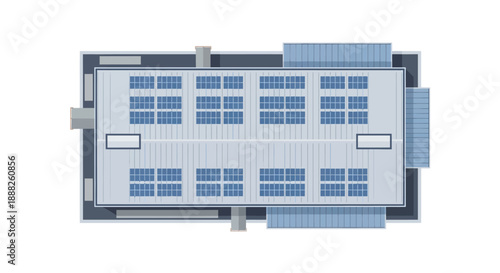 Top view of a large industrial building with solar panels on the roof.