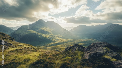 Stunning mountain landscape with lush greenery and dramatic skies. Nature at its finest in the serene wilderness.