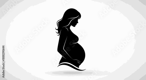 Elegant silhouette of a pregnant woman standing in a bright studio, symbolizing motherhood and anticipation.