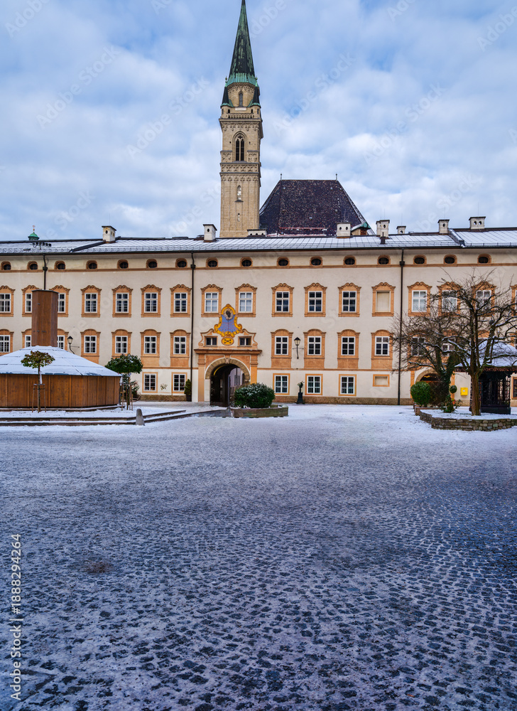 Fototapeta premium Vertical View of St. Peter's Abbey Courtyard and Franciscan Church Tower