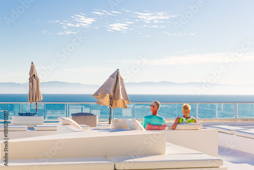 North America, Mexico, Nayarit, Bahia de Banderas, Nuevo Vallarta. Mature couple looking out over ocean. Model Released.