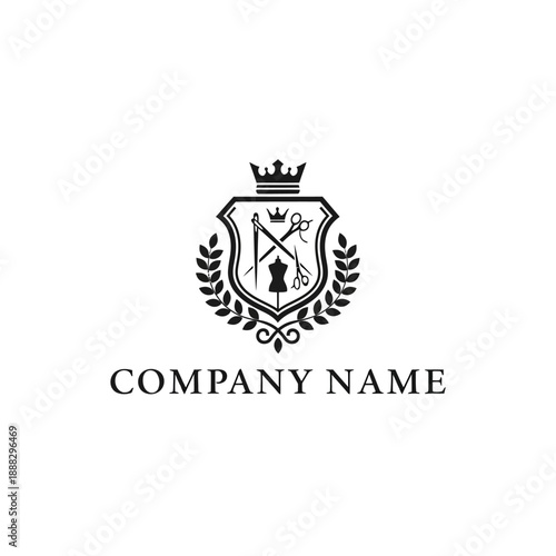 Elegant Tailoring and Fashion Design Emblem with Crown and Laurel Wreath.
